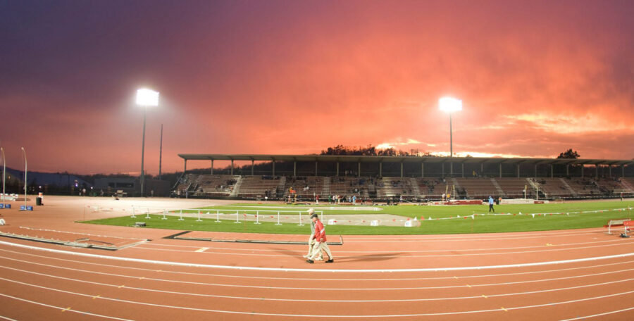 John McDonnell Field outdoor track and grandstands at sunset at the University of Arkansas