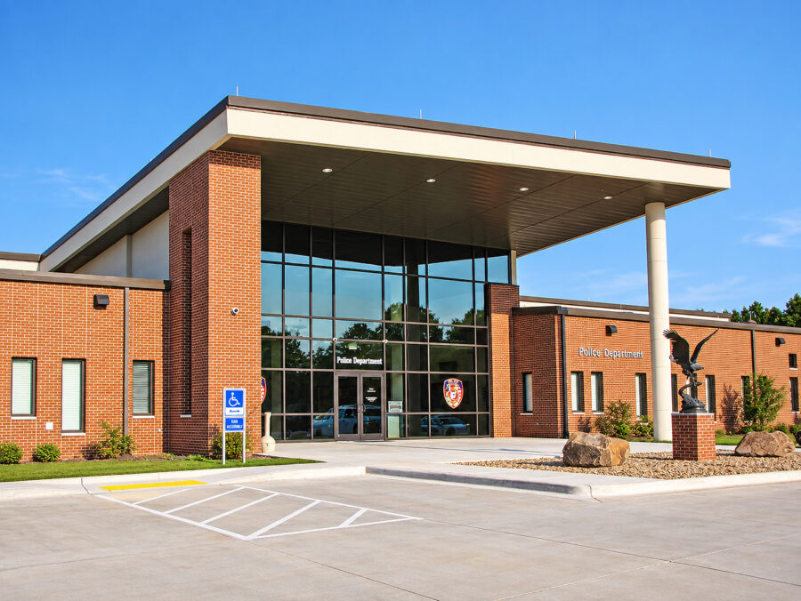 Main entrance of the Jacksonville 911 Center and Police Department featuring brick and glass architecture