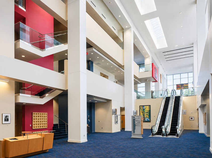 Multi-level atrium at the Statehouse Convention Center in Little Rock, AR, featuring open circulation, glass railings and escalators.
