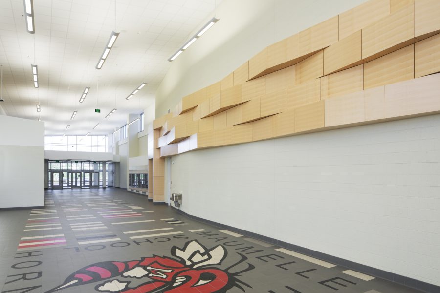 Lobby and gathering space inside the Maumelle High School Performing Arts Center.