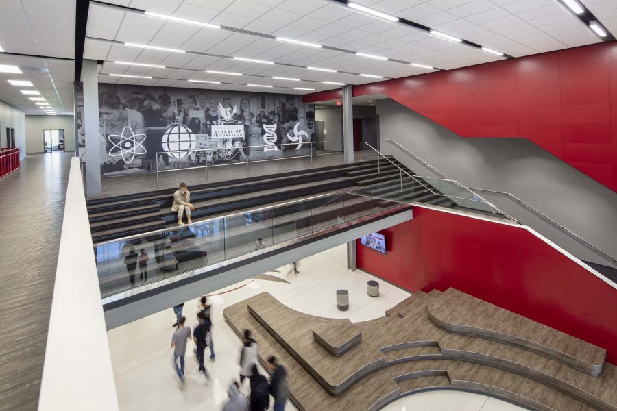 Don Tyson Innovation 2 Modern open-concept collaboration commons and student gathering area inside Don Tyson School of Innovation Phase II by WDD Architects.