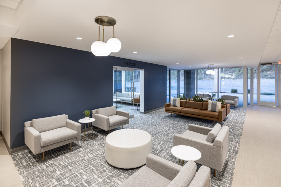 Interior view of lounge and waiting area at Fellowship Bible Church Midtown Campus in Little Rock, Arkansas, featuring modern furnishings.